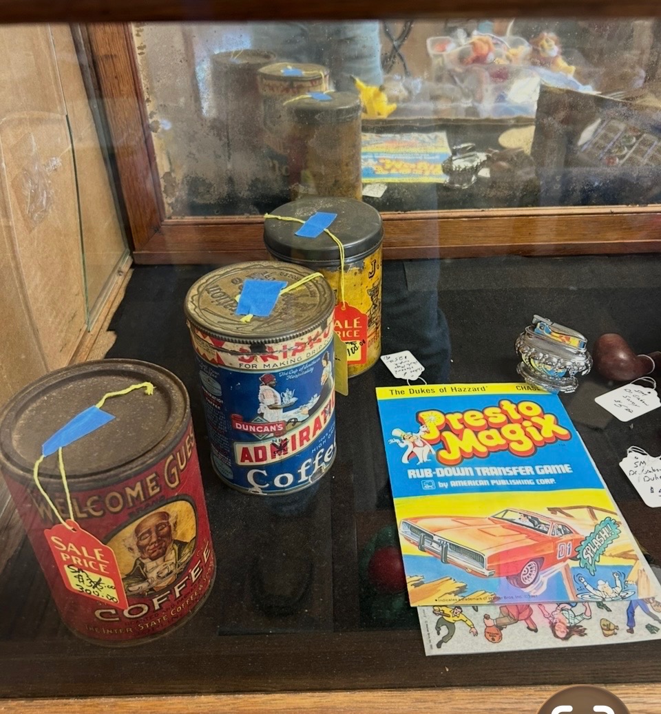 Antique coffee tins including Welcome Guest and Duncan's Admiration
